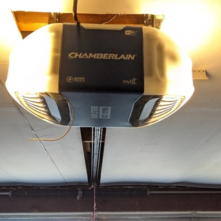 Brand new Chamberlain garage door opener (with battery backup).